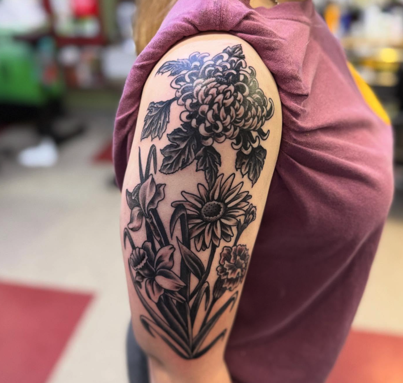 Floral black and grey tattoo by Pat at Saginaw tattoo shop