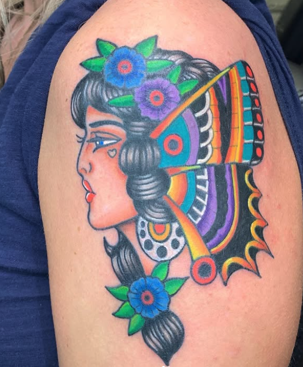 Native butterfly tattoo by Goose Saginaw MI