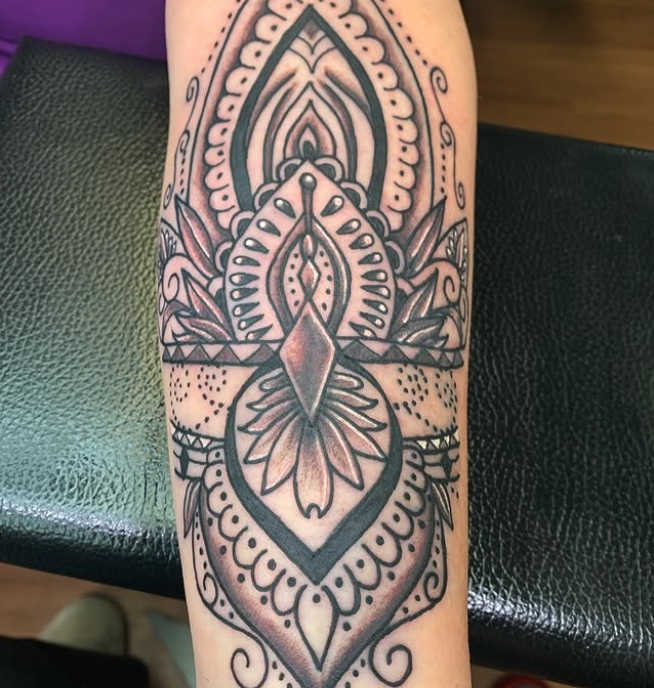 Tribal symmetrical tattoo by Goose at Old Town Tattoo Saginaw